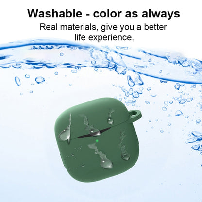 Waterproof silicone earbuds case with clip, shown under splashing water