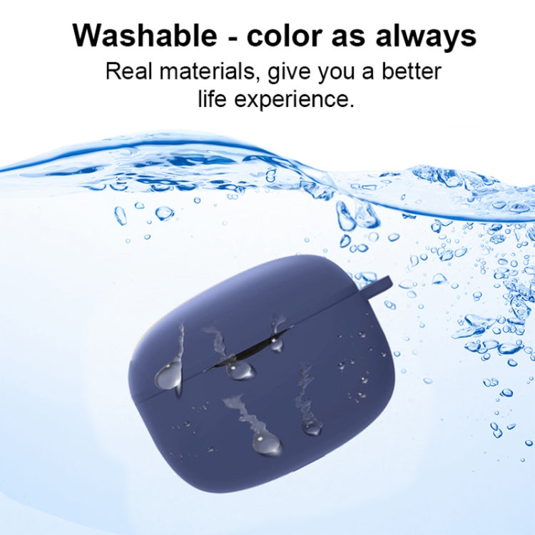 Blue silicone Bluetooth earphone case near water droplets; lid open with earbuds inside