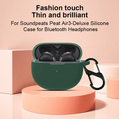 Green silicone earphone case with carabiner and open lid for charging