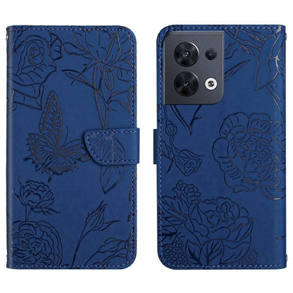 Blue embossed butterfly flip leather phone case with stitched fold-over strap