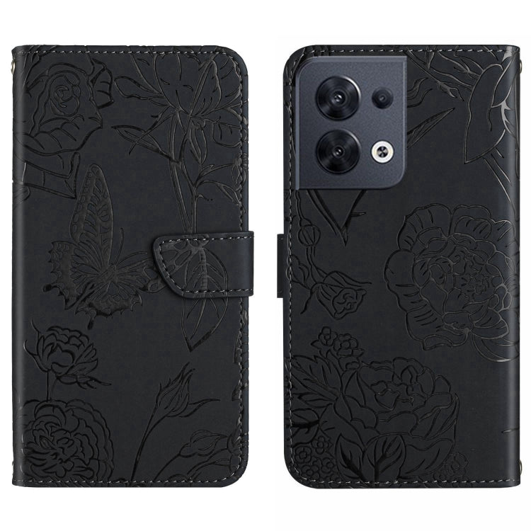 Black embossed butterfly flip leather phone case with stitched fold-over strap
