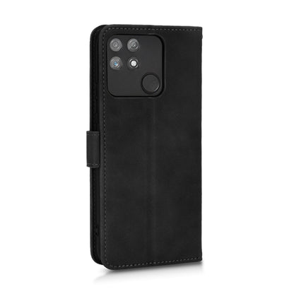 Black magnetic flip leather phone case with camera cutout and folio strap