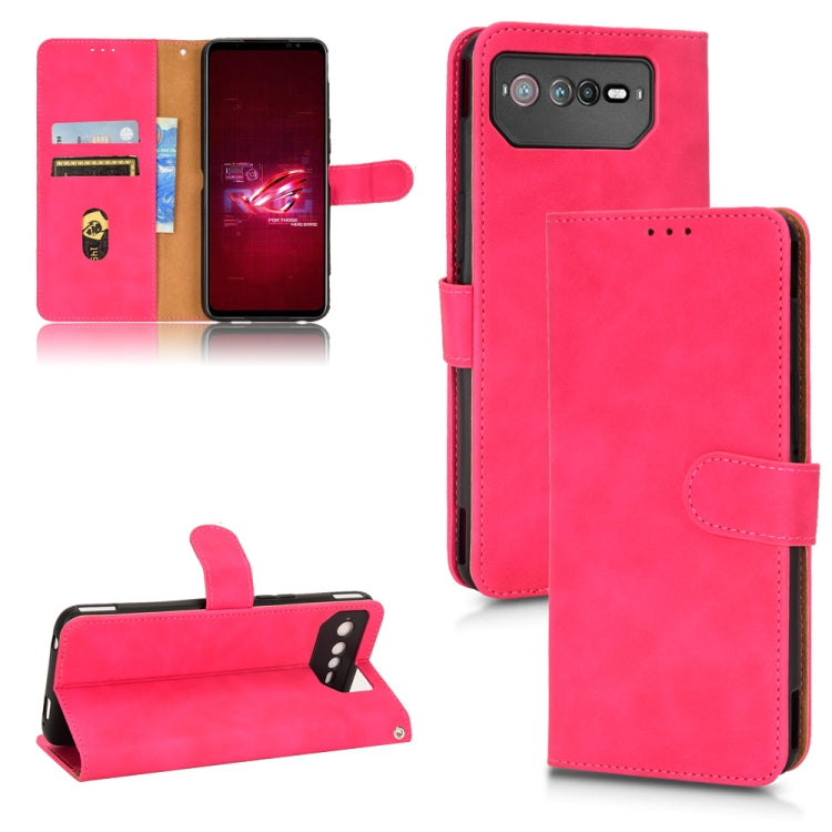 Rose red leather folio phone case with magnetic closure, card slots, and camera cutout