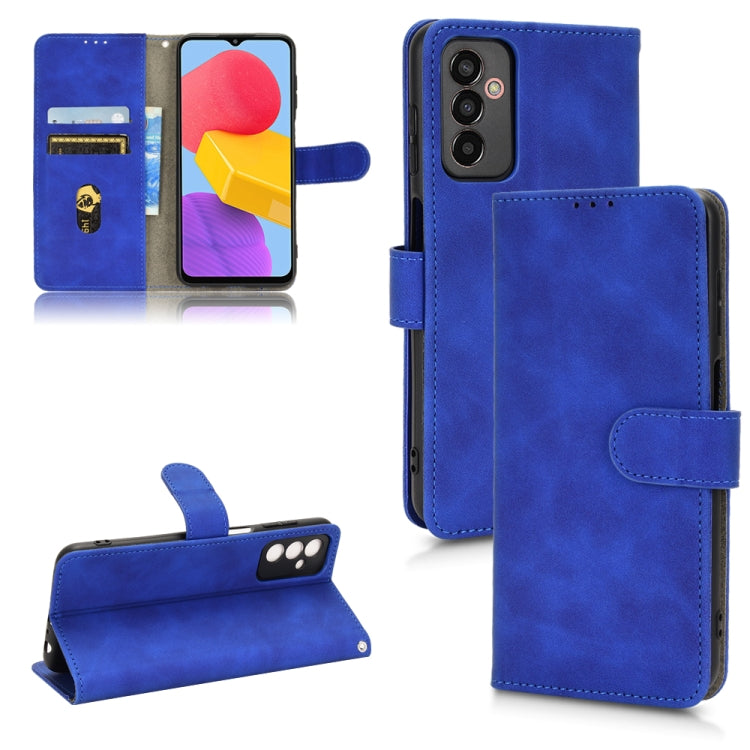 Magnetic flip leather phone case in blue, wallet-style with card slots and camera cutout.