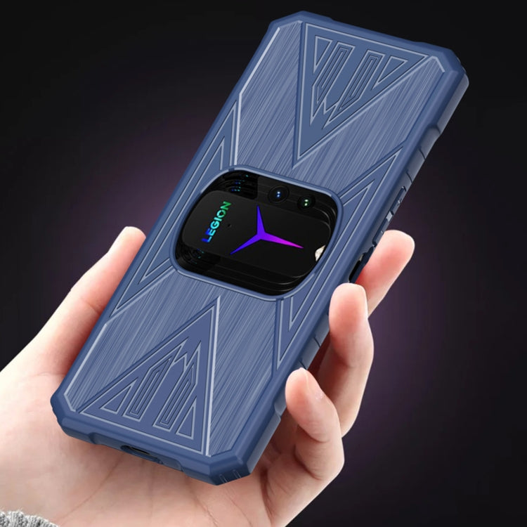 Blue case with angular geometric texture and camera window, held in hand