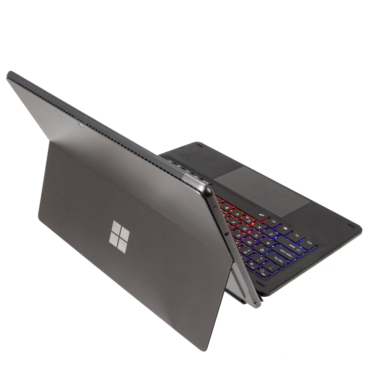 Side view of dark Bluetooth keyboard case with integrated touchpad and ports