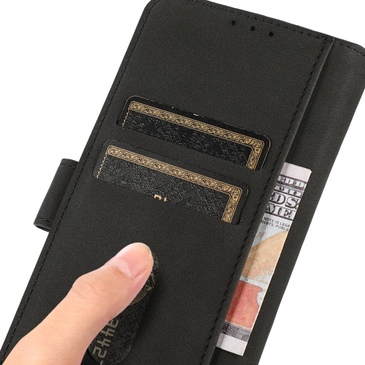Black matte leather phone case with card slots, close-up showing a hand inserting cards