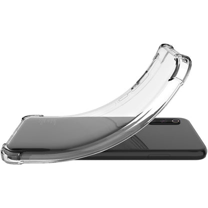 Clear shockproof TPU phone case with curved corner protection and raised edges