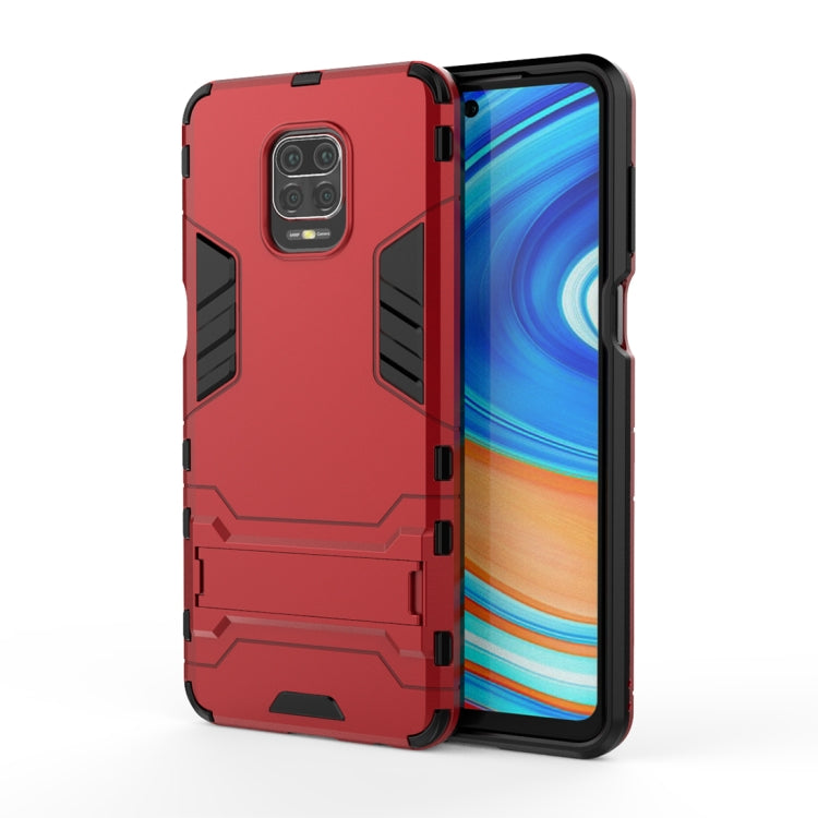 Red rugged shockproof phone case with TPU bumper and camera guard, angled front view