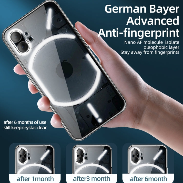 Crystal-clear ice-crystal phone case held in hand with camera cutouts and bumper