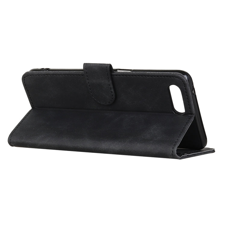 Black horizontal flip phone case with built-in kickstand for hands-free viewing