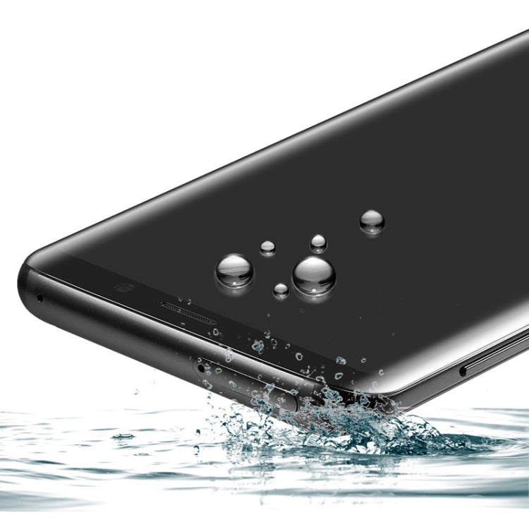 Tempered glass screen protector showing water droplets on a curved surface