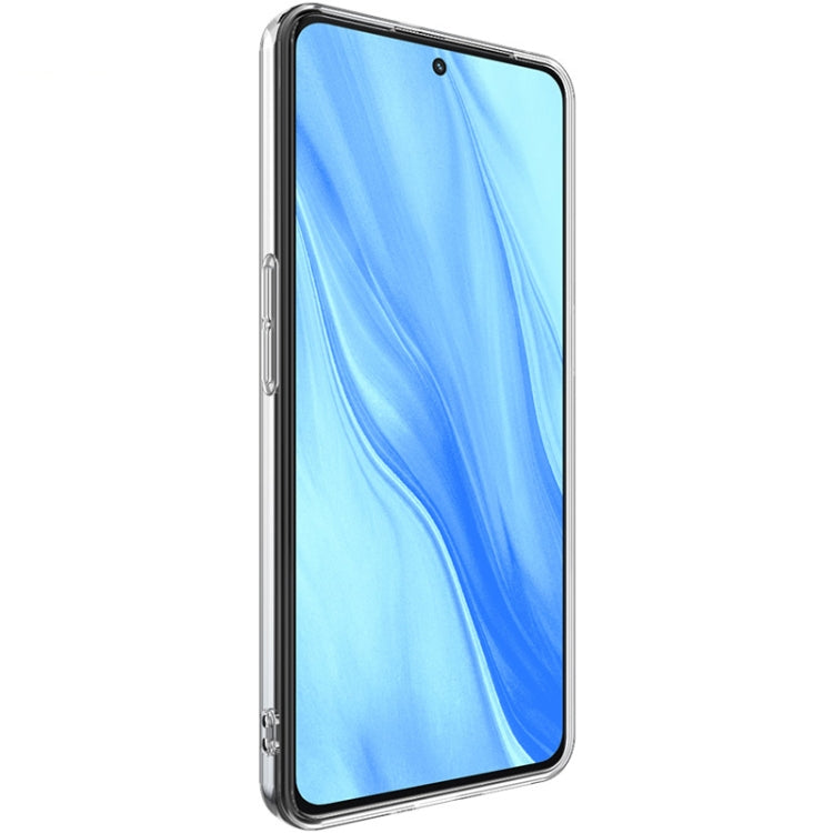 Clear slim TPU phone case covering a blue phone front with protective edges
