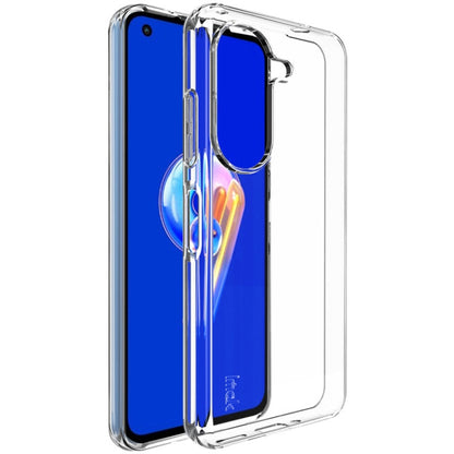Clear TPU phone case with raised edges and camera cutout over a blue phone