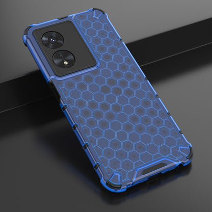 Shockproof phone case with honeycomb hex design, blue, angled view.