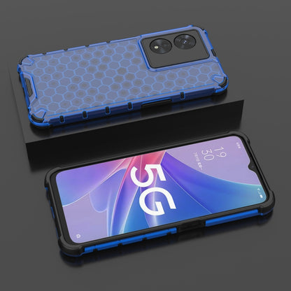 Shockproof phone case with honeycomb pattern, blue; back and front views shown.
