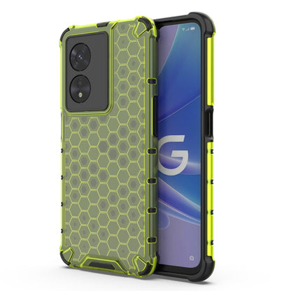 Shockproof phone case with honeycomb pattern, lime green with raised edges.