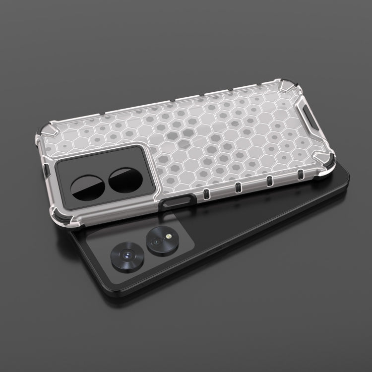 Shockproof honeycomb phone case in clear with hex pattern, side buttons and camera openings