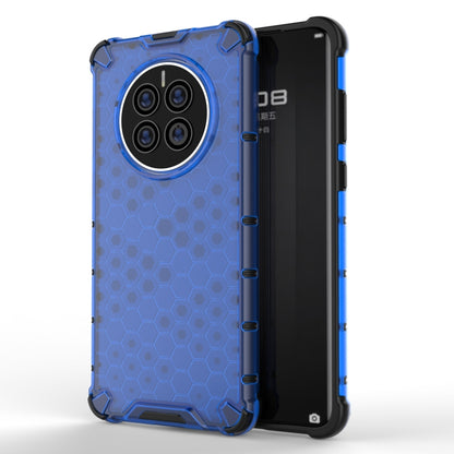 Shockproof phone case with honeycomb pattern, blue; four-camera back cutout.