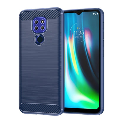 Blue TPU phone case with brushed texture and carbon-fiber corner accents, cutouts