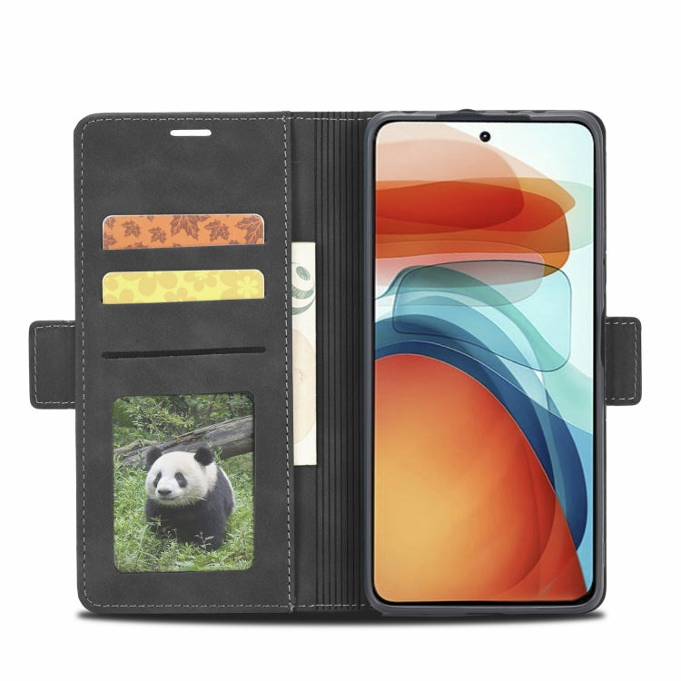 Black leather wallet phone case with photo card window and multiple card slots.