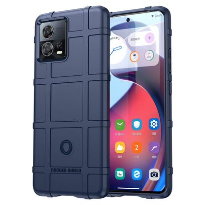 Blue shockproof TPU phone case with rugged shield pattern and raised corners
