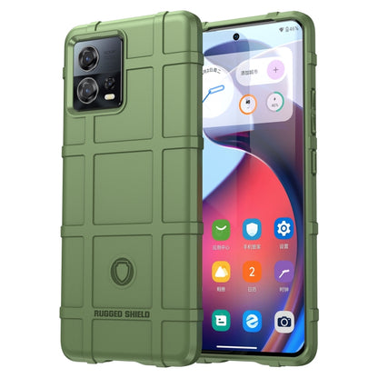 Green shockproof TPU phone case with rugged shield pattern and raised bezel