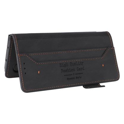 Black leather flip phone case with card holder panel and stitching detail