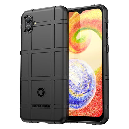 Shockproof TPU phone case with rugged shield texture, black, full coverage camera cutouts