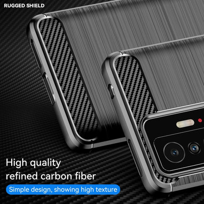 Black TPU case with diagonal carbon fiber accents and brushed grip texture