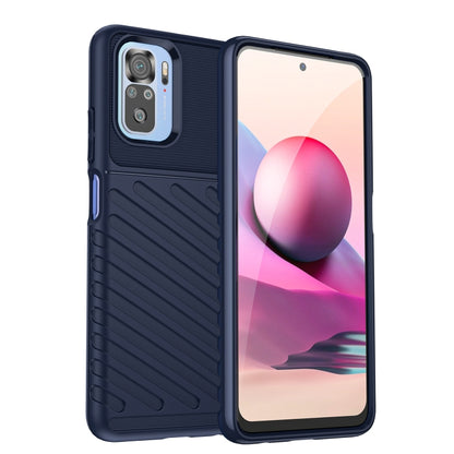 Rugged blue TPU phone case with textured grip, raised edges, and camera cutouts