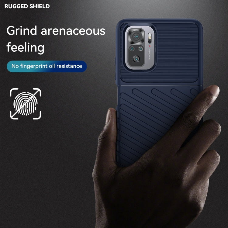 Blue rugged TPU phone case with textured back and triple camera cutout