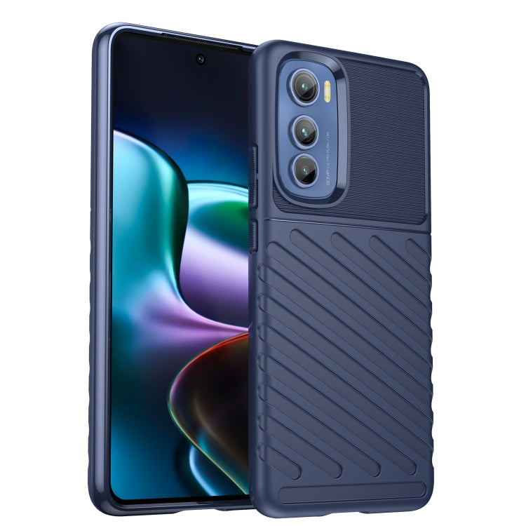 Blue rugged TPU phone case with textured pattern, side buttons, and camera cutouts