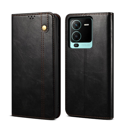 Black crazy horse leather flip phone case with magnetic snap and camera cutout