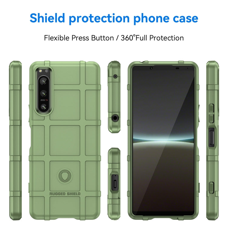 Green rugged TPU phone case, front and back view with port cutouts