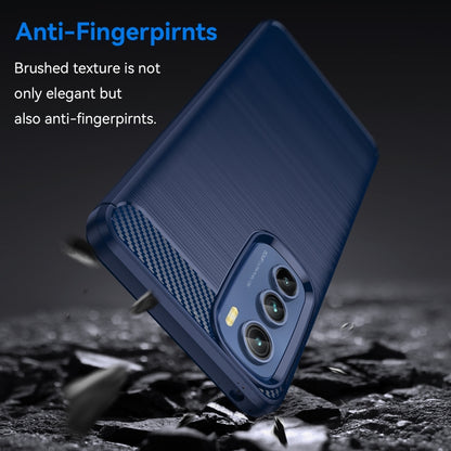 Blue TPU phone case with brushed texture and carbon-fiber detail near camera