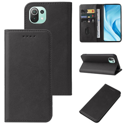 Black leather phone case with magnetic closure, card slot, and stand cover
