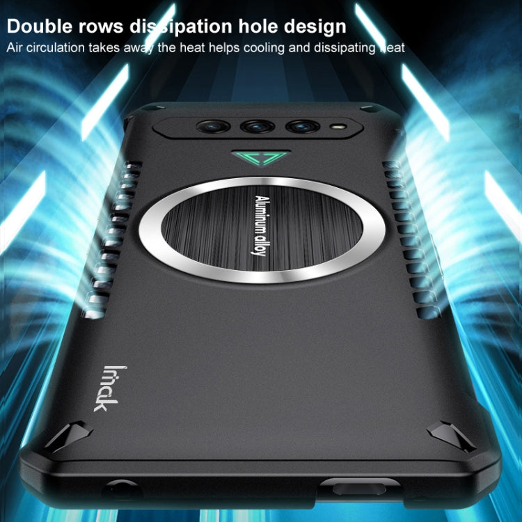 Black gaming cooling case front view with circular aluminum ring and ventilation holes