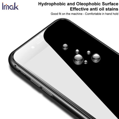 Tempered glass screen protector with water droplets on the hydrophobic surface