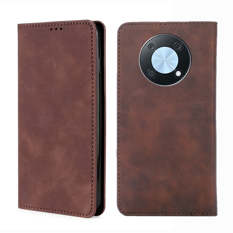 Dark brown magnetic horizontal flip leather phone case with circular front clasp and stitching