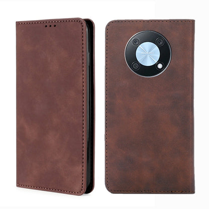 Dark brown magnetic horizontal flip leather phone case with circular front clasp and stitching