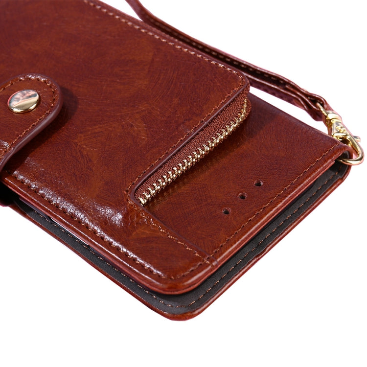 Brown leather zipper phone case with front card slot and stitched flap