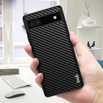 Black carbon-fiber phone case with camera cutout and secure front lip