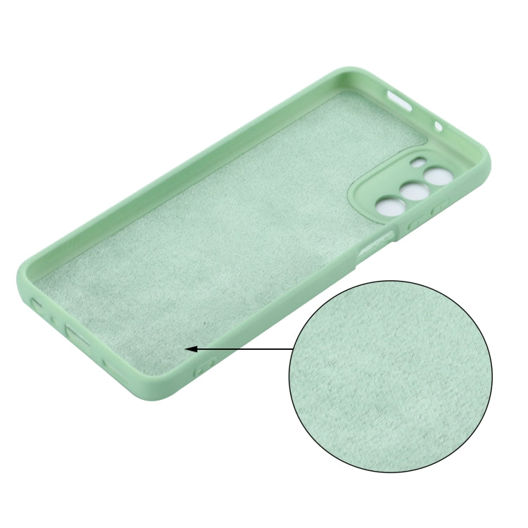 Mint green textured silicone phone case with camera and side button cutouts