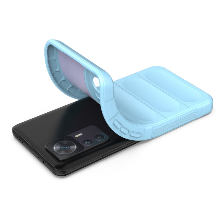 Light blue TPU phone case with flannel lining, hinged stand open over phone