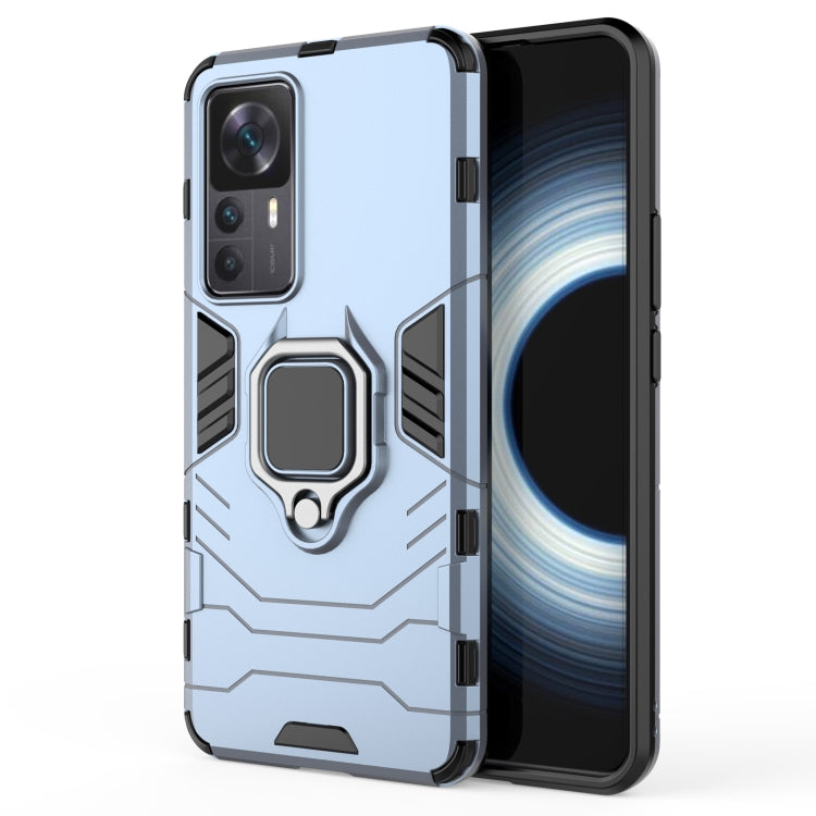 Magnetic ring phone case with TPU bumper, navy blue, with ring holder and camera openings.