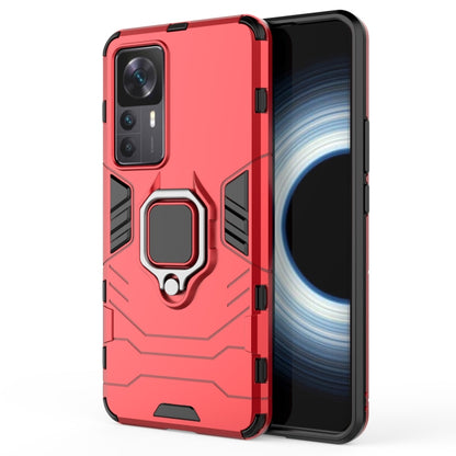 Magnetic ring phone case with TPU bumper, red, showing ring holder and side button openings.