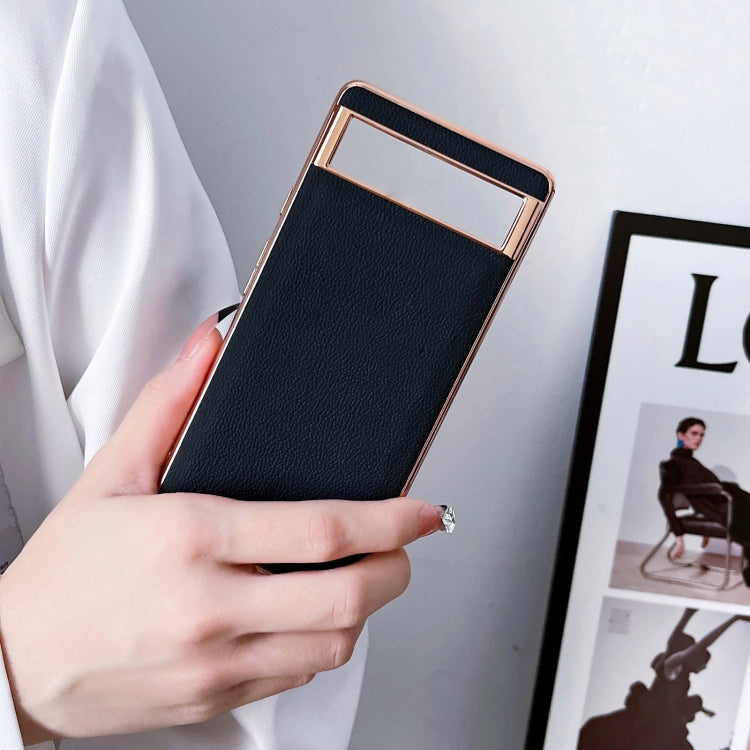 Genuine leather phone case with black panel and rose-gold frame, card-slot style