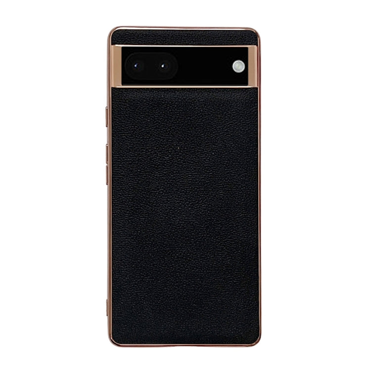 Black textured leather phone case with top camera cutout and gold-tone border