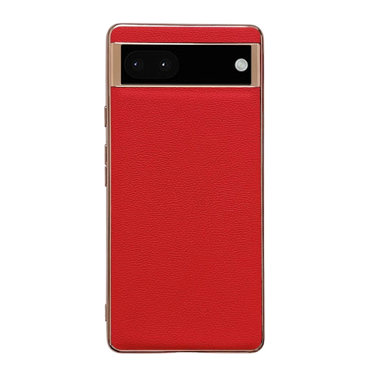 Red textured leather phone case with top camera cutout and gold-tone border